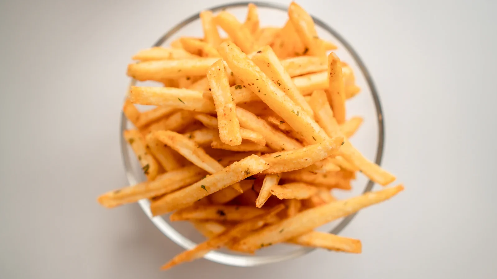 Bowl of french fries photographed from above